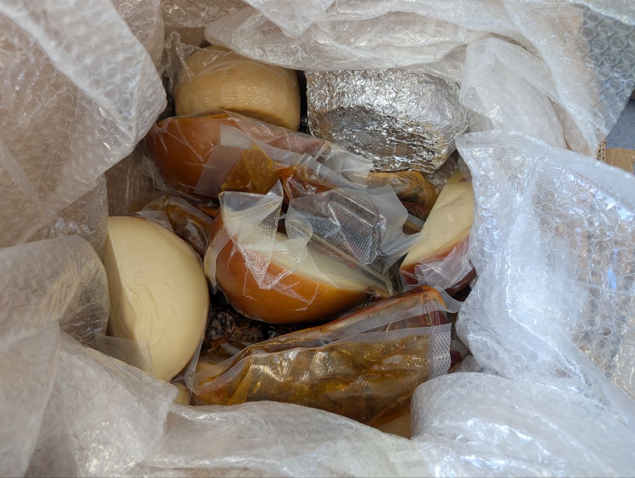 Carefully packed box of Southern Italy products ready for shipping